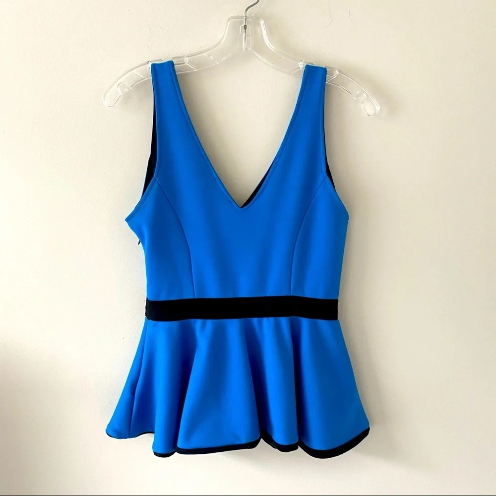 Aqua Sleeveless Peplum Top Shirt from Bloomingdales Blue | Size XS
